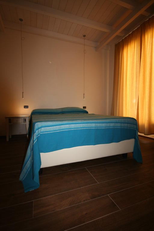 Villa La Conchiglia Rooms Cala Liberotto Habitación foto
